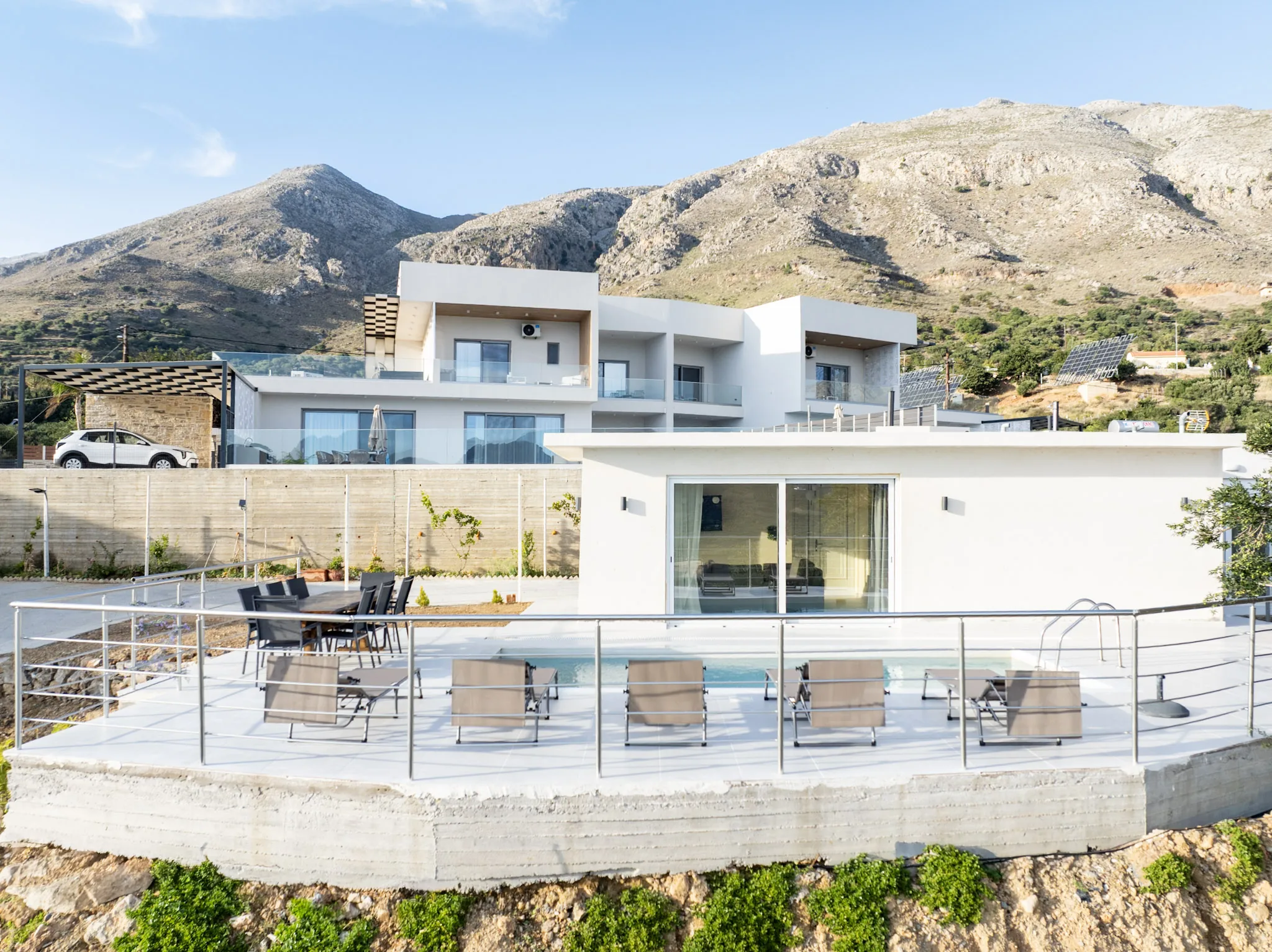 The Pool House in front, Houses One and Two in the building behind